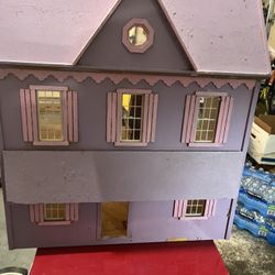 Doll House With Furniture And Dolls