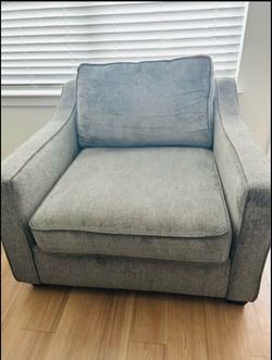 Sleeper sofa with matching chair along with office desk and bar stools