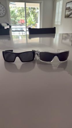 2 pairs Oakley glasses