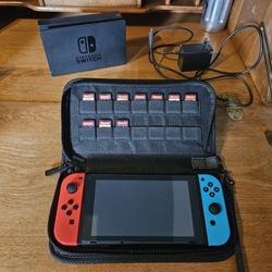Nintendo Switch and 10 GAMES and Carry Case