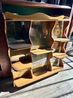 Vintage mirrored wall shelf