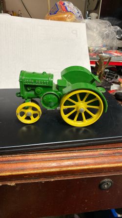 John Deere Cast Iron Tractor 6 1/2 Inch is Long Very Good Condition 