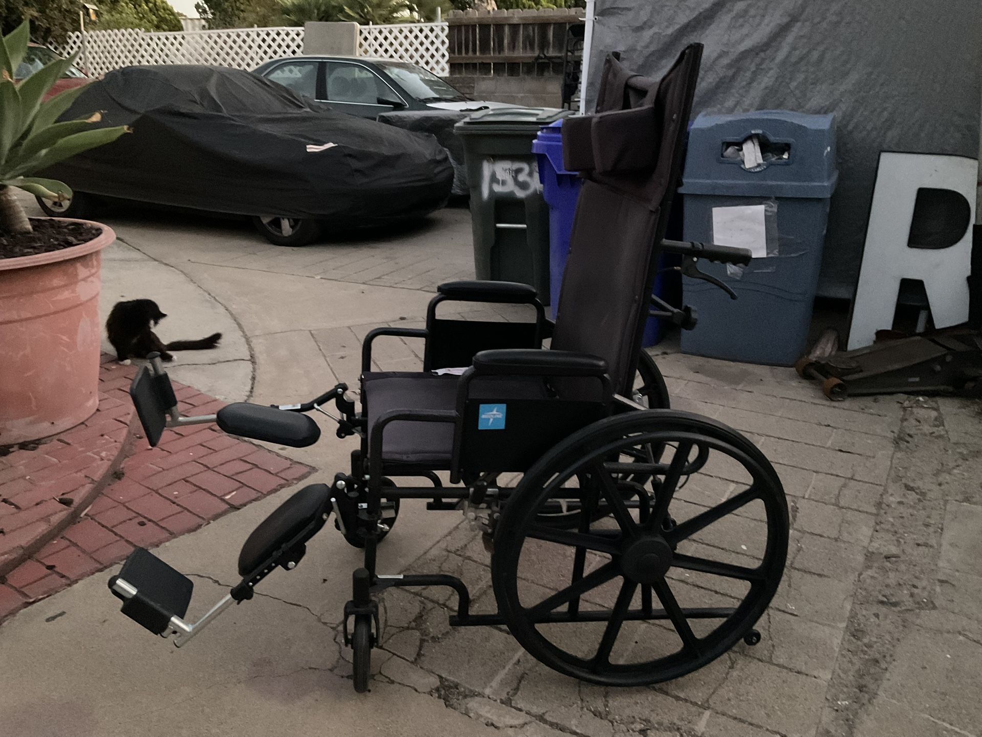Reclining Wheelchair With Elevating Leg rests, Headrest Support, And Rear Anti Tippers