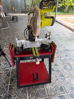 Ryobi 15 Amp 10 in. Corded Sliding Compound Miter Saw with LED Cutline Indicator and table