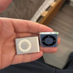 2 iPods (one regular 1 Water Proof 