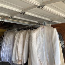 Reduced***SALE   Tuxedo ‘s    Are Off White  There Is 18-20 Tuxedo Shirts, Some Black Pants And Tuxedo Jackets  A Few Vests  Most Are Oscar Delarenta 
