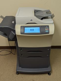 HP Laser Jet 4345MFP with Roller Cabinet 
