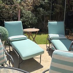 2 lounge chaises with custom cushions