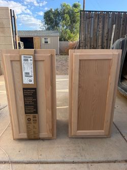 2 Hampton Bay Unfinished Wood Cabinets – $60 for Both