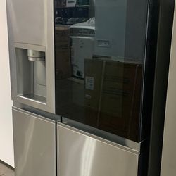 Refrigerator**Stainless Steel- Best Deal or Make us An offer!