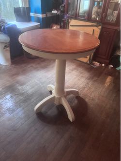 Round Pedestal Table