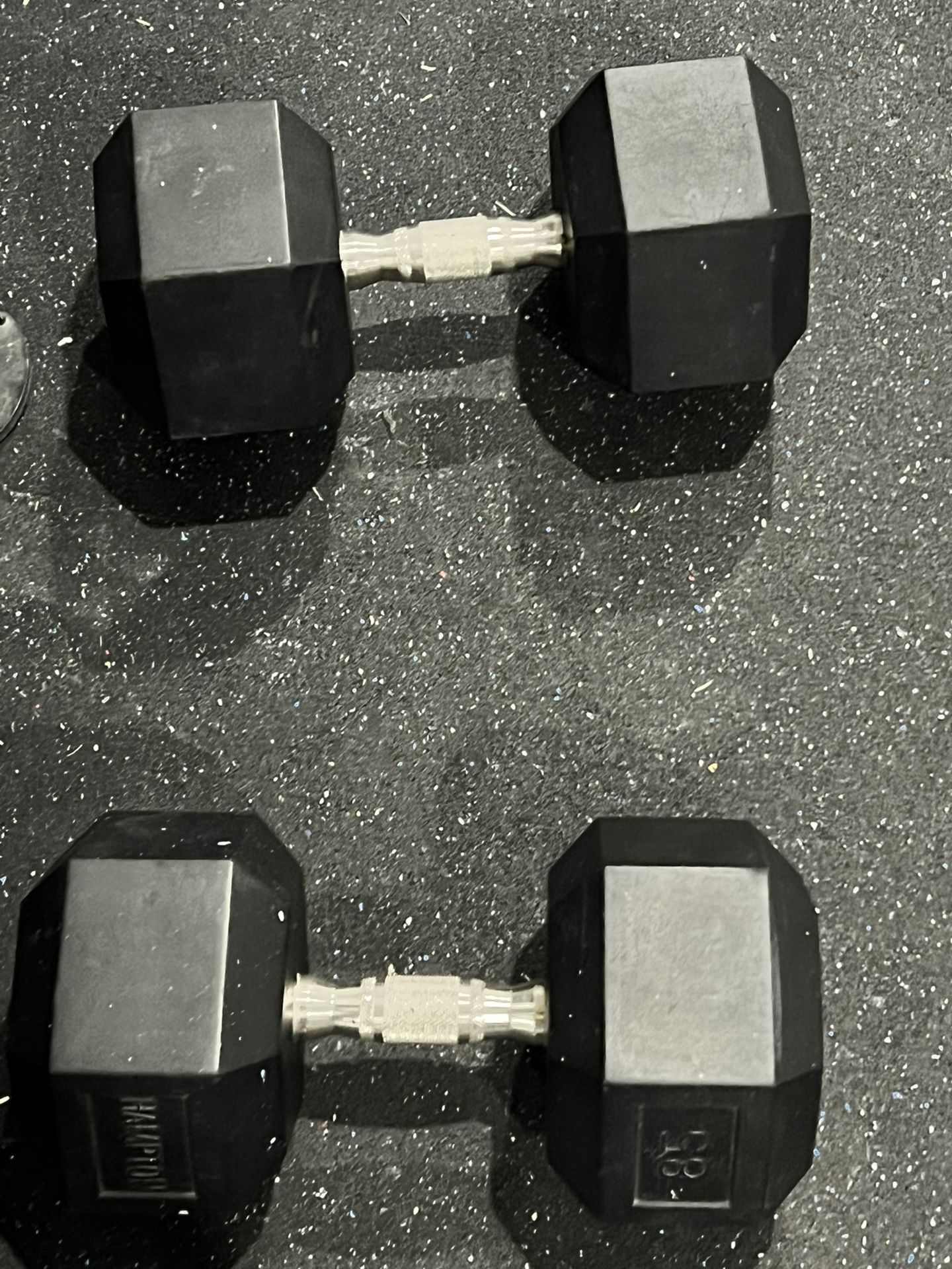 100 Pound Set And 85 Pound Set Of Dumbelss