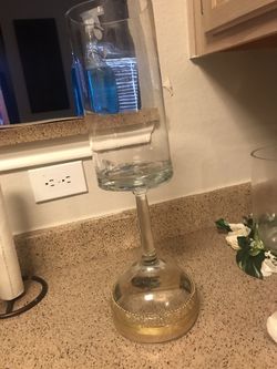 Large vase and vase with flowers