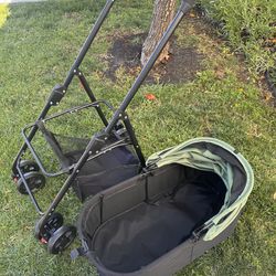 Pet Stroller Basket and Wagon style. Pet weight limit 55lbs.  Brand New folding stroller