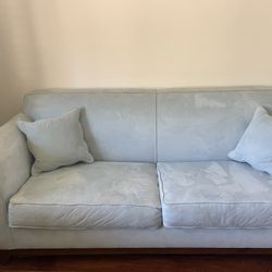 Blue Couch With Matching Pillows