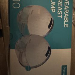 Portable breast pump