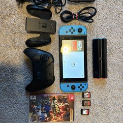 Nintendo Switch + 4 Games (hablo Espanol)