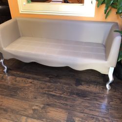 Custom-made green leather loveseat like new condition barely used Measurements.  64” L x 24” W x 29” H $425