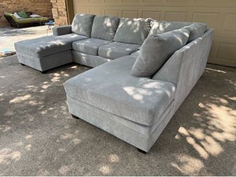 Living spaces Sleeper Sectional Sofa with Pull out Bed and Ottoman/storage