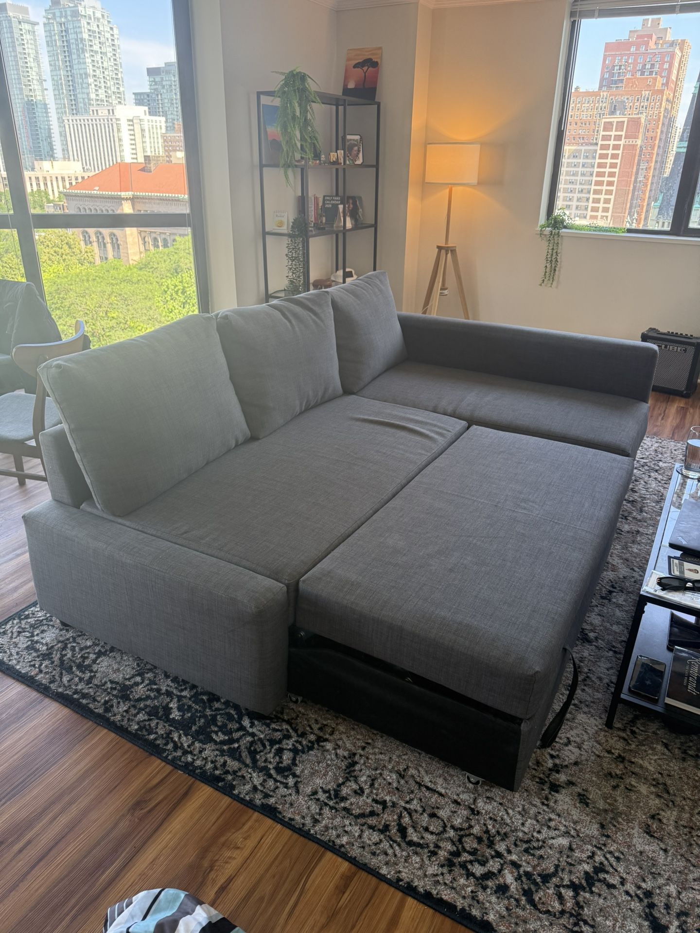 IKEA 3 seat sleeper sectional couch/bed with storage perfect condition open to offers