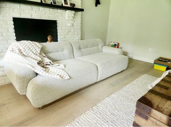 The CB2 Logan Grey Boucle Sofa. Retail: $1,600