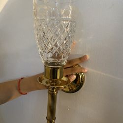 Wall held candle holder