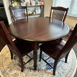 Cherry Round Kitchen Table And Rug