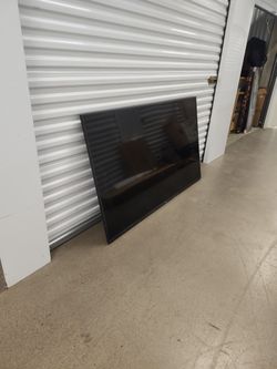 65 Inch Samsung Flat-screen TV.