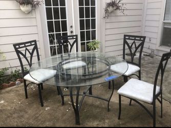 Glass table with 4 chairs excellent condition