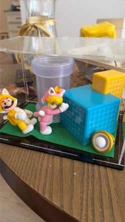 Mario and peach figurines