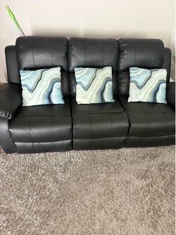Black leather couch.