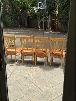 Solid wood dining table and four chairs