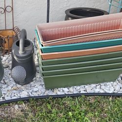 8 RECTANGLE PLANT POTS AND 2 WATER CANS $5 EACH