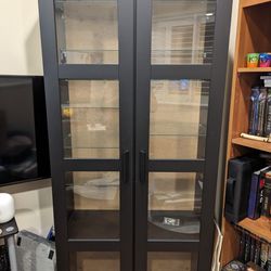 Black Ikea BRIMNES glass door cabinet with glass shelves 