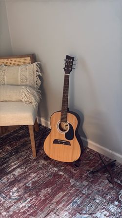 small beginner acoustic guitar