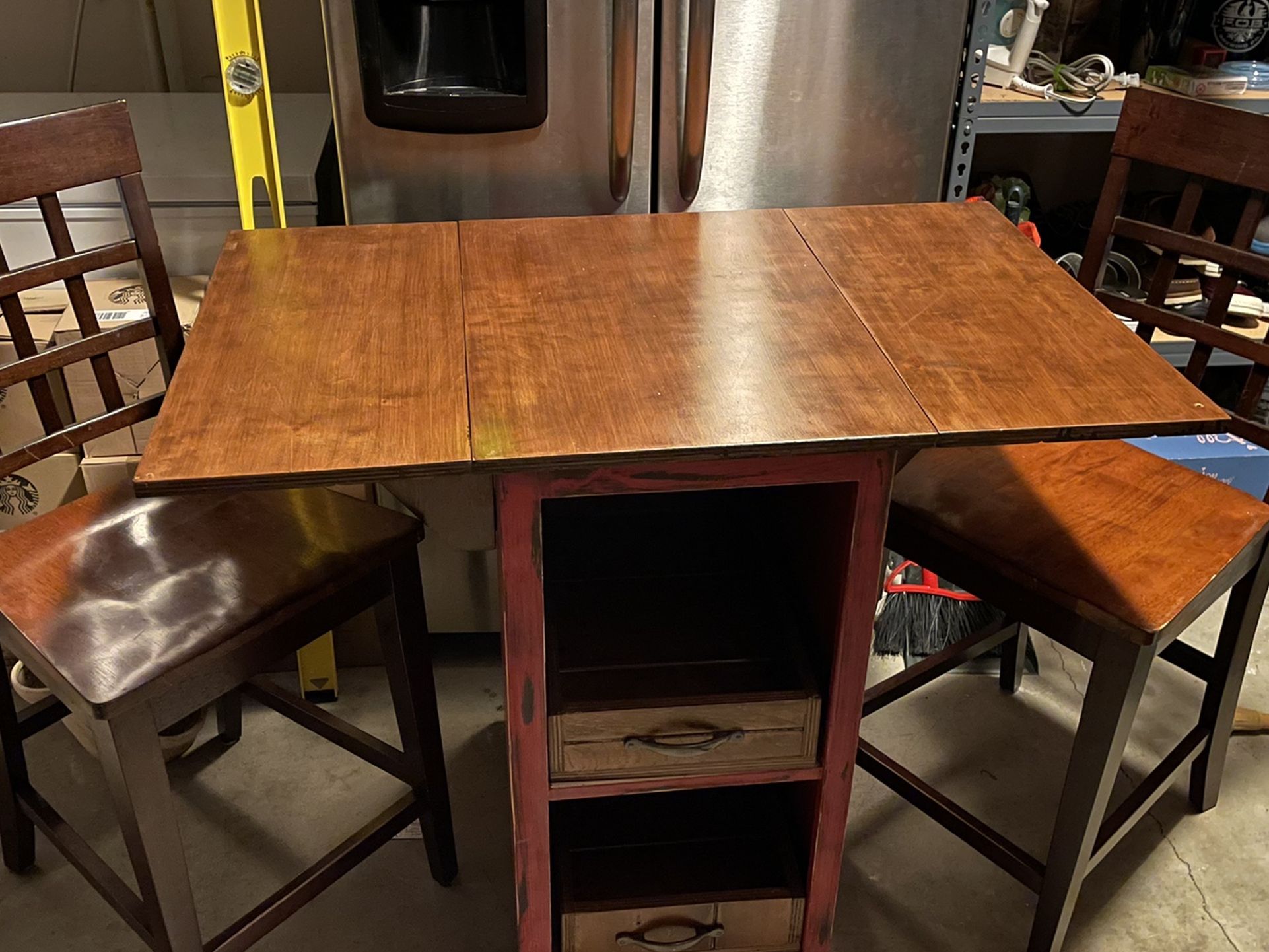 Two Chair, Two Drawer, Rolling Sitting Table with collapsible sides.