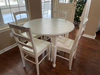 Hardwood Round 36” table and 4 chairs-hard wood (placemats and chair pads are not included d )