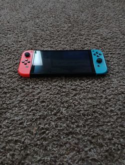 Nintendo Switch OLED — $200 | Full Bundle