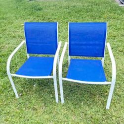 Selling 2 blue and white outdoor patio chairs