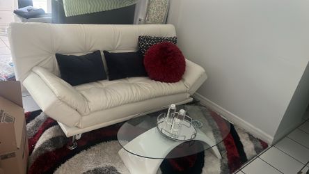 Sofá cama con mesa