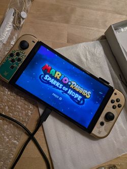 Zelda switch with 4 games  boxed like new