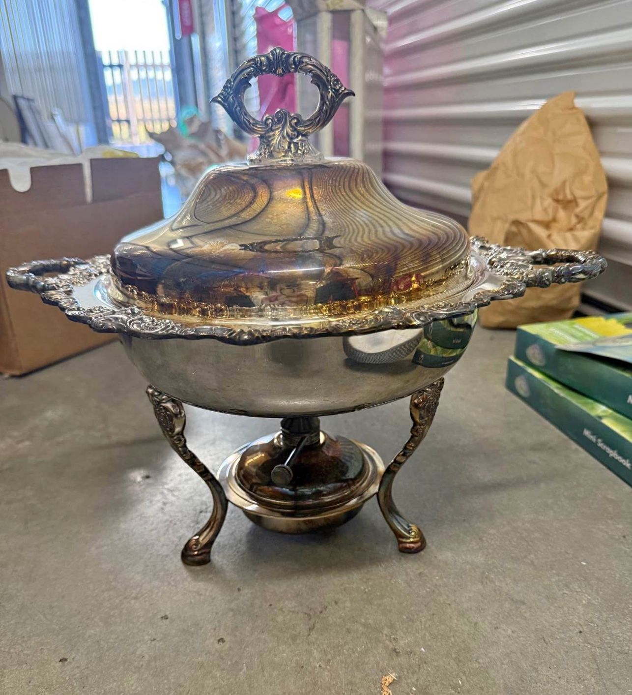 vintage silver-plated chafing dish with a burner.