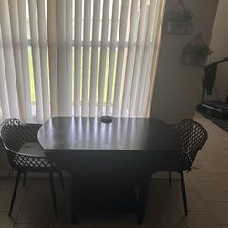 Black Extendable Round Solid Wood Base Dining Table