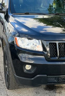 2013 Jeep Grand Cherokee Headlights