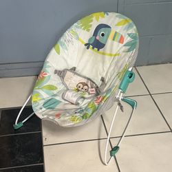 Bright Starts Rainforest Vibes 3-Point Harness Vibrating Baby Bouncer with -Toy bar