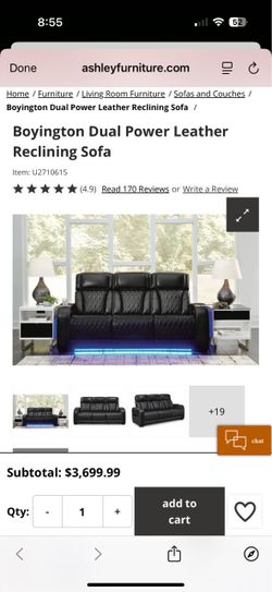 Ashley Boyington Dual Power Leather Reclining Sofa