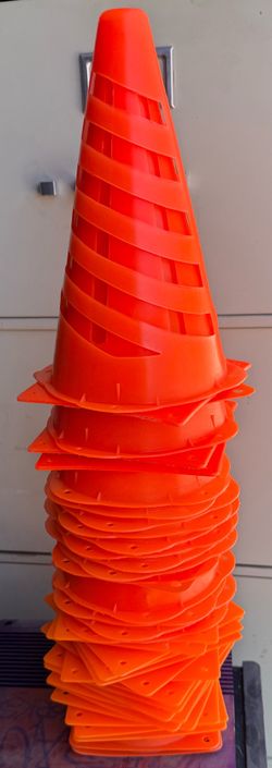 Used once at a picnic to create an obstacle course. In good condition.   Sports - ( 35+ Flexi Field Cones )