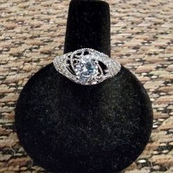 STERLING SILVER CZ RING.  SIZE 7.  NEW. PICKUP ONLY