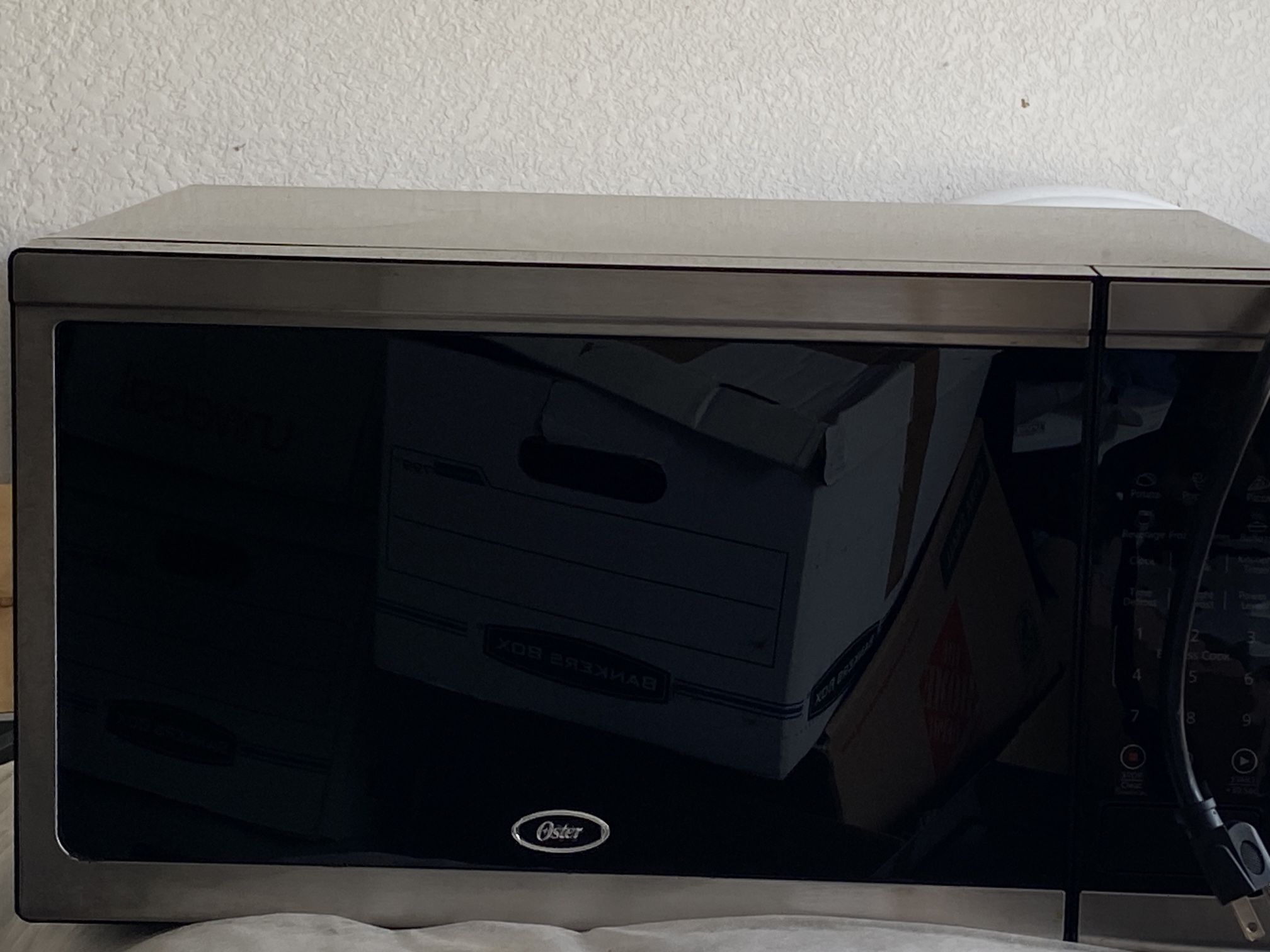Microwave Oster OGCMDM11S2-10