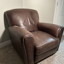2 Leather lounge chairs with ottoman